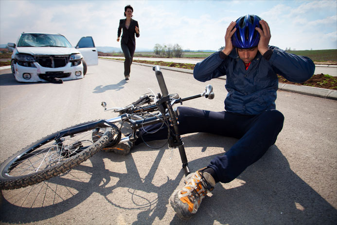 bicyclist injured by car