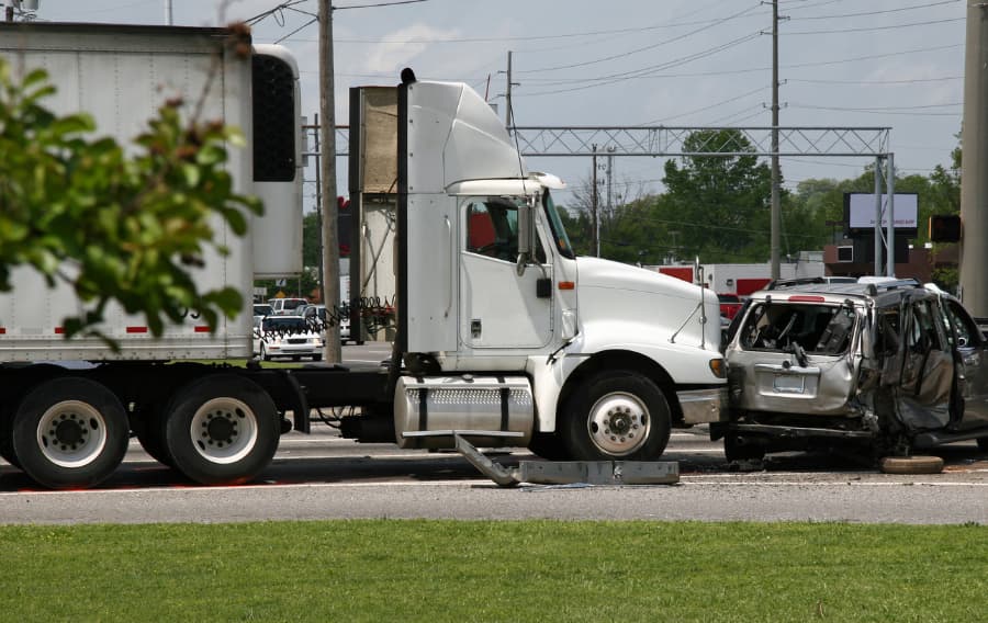 Big truck after collision with a smaller vehicle