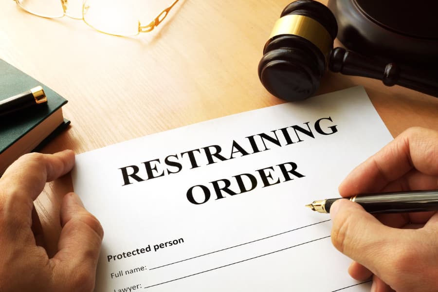 Restraining order document being filled out 